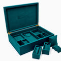 Effy Signature Jewelry Box with 7-piece removable inserts in teal velvet features organized compartments, removable trays, a pillow, and a round section. Open the box to display versatile storage options, with the ESPY brand name elegantly embossed inside the lid.