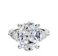 A 14K white gold engagement ring with a three-stone design showcases a center stone accented by two pear-shaped side stones (0.25TCW), displayed against a plain white background.