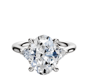 A platinum engagement ring featuring a central diamond with two trillion-cut side stones (0.125TCW), displayed on a plain white background.