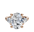 The 14K Rose Gold 3-Stone Trillion Side Stones 0.25TCW Engagement Ring features a central diamond secured by four prongs and two sparkling trillion side stones, all set on an elegant rose gold band.