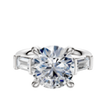 A 14K white gold engagement ring with a three-stone design, featuring an east/west setting and baguette side stones, totaling 0.25 carats.