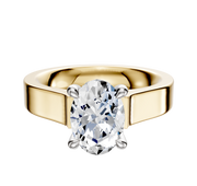 An 18K two-tone engagement ring with a flat 4.0mm band featuring a large diamond solitaire in a 4-prong hidden halo cathedral setting.