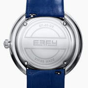 The 39MM Swiss Made Stainless Steel Turtle Watch features diamonds, sapphires, and tsavorite. It has a blue strap and dial, jeweled turtle motif in green and white stones, a diamond-encrusted silver bezel, and EFFY branding on the face.