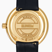 The 39MM Swiss Made 18K Yellow Gold Signature Round Panther Watch with Diamonds features a jeweled panther face on a glossy black dial, green eyes, gold hands, and a diamond-encrusted bezel with a black leather strap for luxurious elegance.