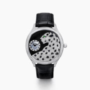 The 41MM Swiss Made Stainless Steel Signature Panther Watch with Diamonds features a jeweled panther design with black spots, emerald eyes, and a diamond-studded face, displaying the time in a small subdial.
