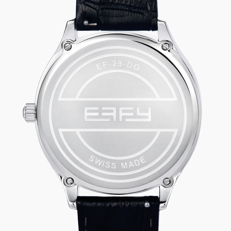 The 41MM Swiss Made Stainless Steel Peacock Watch features diamonds, sapphires, a black leather strap, and a jeweled peacock design with multicolored gemstones and a small round time display on the left side.