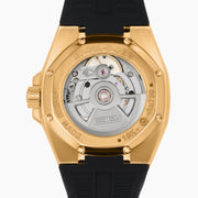 The EARFY 38MM Swiss Made 18K Yellow Gold Automatic Watch features a hexagonal case, black dial with diamond hour markers, black rubber strap, and double row of diamonds outlining the face. Brand name displayed on the dial.