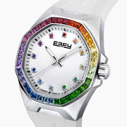 The 38MM Swiss Made Stainless Steel Automatic Watch features a white strap, silver bezel, rainbow gemstones around the face, a white dial with silver hands, colorful hour markers, and EARLY branding at the top.