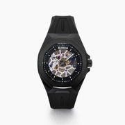 The 42MM Swiss Made Stainless Steel with Black PVD Automatic Skeleton Watch features a skeleton dial, black rubber strap, hexagonal case, and the white BEFY logo at the top against a plain white background.