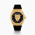The 42MM Swiss Made 18K Yellow Gold Signature Panther Automatic Watch with Diamonds features a geometric panther face, green gemstone eyes, diamond markers on a black dial, and "EARLY" at the top—an artistic twist on a classic gold watch.