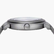 The 41MM Swiss Made Stainless Steel Automatic Skeleton Watch features a silver metal band, white face, black hour markers, and an open skeleton dial displaying inner gears. "ESPY" is printed below the 12 o’clock position.