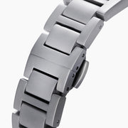 The 41MM Swiss Made Stainless Steel Automatic Skeleton Watch features a silver metal band, white face, black hour markers, and an open skeleton dial displaying inner gears. "ESPY" is printed below the 12 o’clock position.