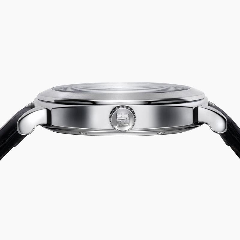 The 41MM Swiss Made Stainless Steel and Leather Automatic Skeleton Watch features a black leather strap, silver case, black skeleton dial, and white hour markers with numerals at 3, 6, and 9 to showcase Swiss precision craftsmanship.