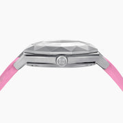 The 36MM Pink Swiss Made Titanium Watch with Diamonds features a faceted silver titanium case, a pink dial adorned with diamond hour markers, and a pink leather strap, elegantly displayed on a white background.