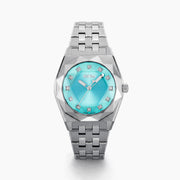 Introducing the 36MM Blue Dial Swiss Made Titanium Watch with Diamonds, featuring a sleek titanium strap, an eye-catching turquoise blue dial, silver hour markers, and dazzling diamond accents at each hour position. This exquisite timepiece captures the refined elegance of Swiss craftsmanship and is beautifully displayed on a white background.