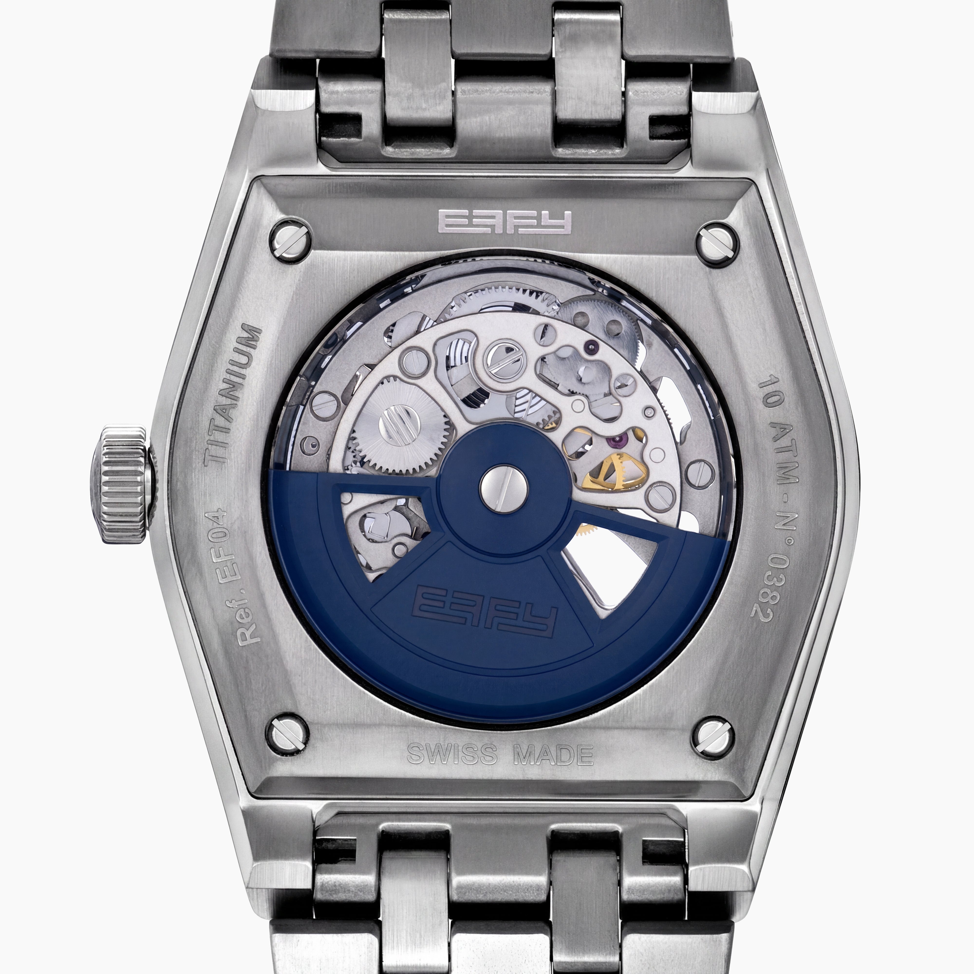 A 42MM Swiss made titanium automatic skeleton watch featuring a geometric bezel that reveals intricate gears and movements beneath the dial, complemented by a metal link bracelet.