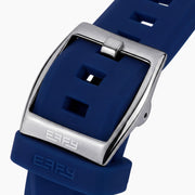 Introducing the 42MM Swiss Made Titanium and Silicone Automatic Skeleton Watch—a luxurious timepiece featuring a geometric silver titanium case and exposed inner mechanisms. Accented with a blue bezel and paired with a blue silicone strap, this design stands out against a white backdrop. Its exceptional clarity and elegance are enhanced by a diamond-cut sapphire crystal.