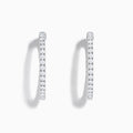The 14K White Gold Inside Out Diamond Hoop Earrings (2.00 TCW) are shown vertically on a plain white background, with their shadows cast to the side.