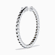 The 14K White Gold Inside Out Diamond Hoop Earrings (2.00 TCW) are shown vertically on a plain white background, with their shadows cast to the side.