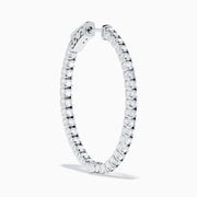 A pair of 14K white gold Inside Out Diamond Oval Earrings, 2.00 TCW, featuring sparkling diamonds, displayed against a plain white background.