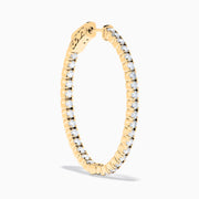 A pair of 14K Yellow Gold Inside Out Diamond Oval Earrings, 2.00 TCW, featuring small round diamonds and displayed against a plain white background.