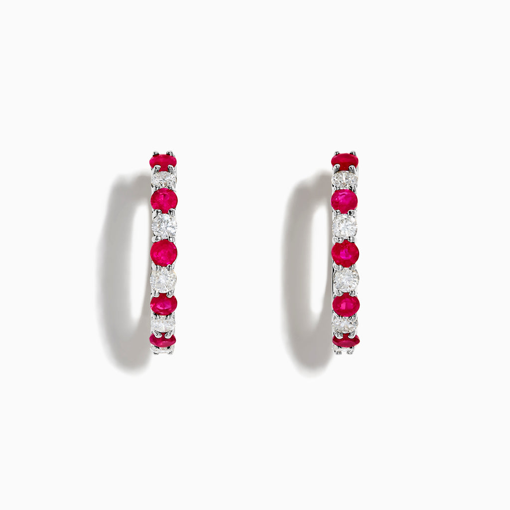 The 14K White Gold Ruby & Diamond Hoop Earrings, 1.35 TCW, feature alternating round red rubies and clear diamonds set in gleaming white gold, shown against a white background.