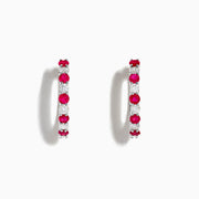 The 14K White Gold Ruby & Diamond Hoop Earrings, 1.35 TCW, feature alternating round red rubies and clear diamonds set in gleaming white gold, shown against a white background.