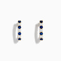 The 14K Yellow Gold Blue Sapphire & Diamond Hoop Earrings, 1.10 TCW, feature alternating sapphires and diamonds in a classic hoop design, shown on a plain white background with visible shadows.