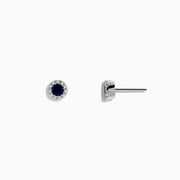 The Royale Bleu 14K White Gold Sapphire & Diamond Stud Earrings, 0.47 TCW, feature round dark blue sapphires encircled by a halo of diamonds, displayed against a plain white background.