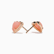 The 14K Rose Gold Pink Opal and Diamond Heart Stud Earrings feature pink heart-shaped centers accented with sparkling diamonds, shown on a white background.