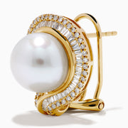 The 14K Yellow Gold Cultured Pearl and Diamond Stud Earrings showcase large round cultured pearls at the center, encircled by a double halo of sparkling diamonds, all displayed against a white background.