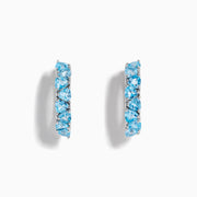 Sterling Silver Blue Topaz Trillion Huggie Earrings