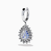 The Effy Hematian 18K White Gold Tanzanite and Diamond Halo Drop Earrings feature large teardrop-shaped blue tanzanites encircled by two rows of sparkling diamonds set in white gold.