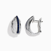 The Royale Bleu 14K White Gold Blue Sapphire & Diamond Earrings (0.62 TCW) feature intersecting bands—one adorned with white diamonds, the other with blue sapphires—shown on a white background.