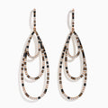 The 14K Rose Gold Espresso, Black, and White Diamond Cascading Teardrop Statement Earrings feature layered loops with alternating diamonds, recalling diamond teardrop elegance on a white background.