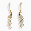 The 14K Yellow Gold Diamond Peacock Drop Earrings feature a peacock design with sparkling diamonds on the head, body, and tail feathers for a luxurious and elegant style.