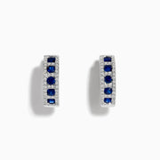 The Royale Bleu 14K White Gold Sapphire & Diamond Hoop Earrings, 1.03 TCW, showcase rows of sapphires bordered by diamond accents, elegantly displayed against a white background.