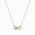 14K Yellow Gold Diamond Accented Infinity Necklace featuring an infinity symbol pendant with diamond accents, displayed against a white background.
