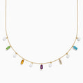 The Mosaic 14K Yellow Multi Color Gemstone Freshwater Pearl and Diamond Necklace features evenly spaced freshwater pearls with green, yellow, purple, clear, and blue gemstones, all set in 14K yellow gold.