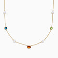 The Mosaic 14K Yellow Multi Color Gemstone and Fresh Water Pearl Station Necklace features evenly spaced blue, orange, and green gemstones with fresh water pearls on a gold chain, displayed on a white background.