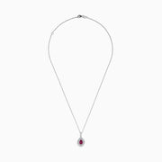 The 18K White Gold Pink Sapphire and Diamond Pendant features a teardrop-shaped pink sapphire surrounded by diamonds, with more diamonds on the bail, shown on a white background.
