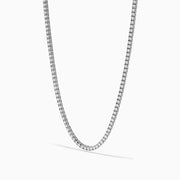 The 14K White Gold Diamond Tennis Necklace, 4.50 TCW, features a continuous row of sparkling white diamonds set in an elegant gold chain, displayed on a plain white background.