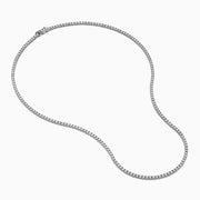 The 14K White Gold Diamond Tennis Necklace, 4.50 TCW, features a continuous row of sparkling white diamonds set in an elegant gold chain, displayed on a plain white background.