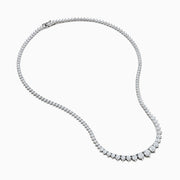 A close-up of the Lab Grown Round Diamond 12.00ct Graduated Tennis Necklace in 14K White Gold, showcasing a continuous row of sparkling lab grown diamonds against a white background.