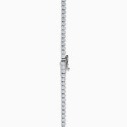 A close-up of the Lab Grown Round Diamond 12.00ct Graduated Tennis Necklace in 14K White Gold, showcasing a continuous row of sparkling lab grown diamonds against a white background.