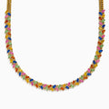The Watercolors 14K Yellow Gold Multi Sapphire Necklace features a repeating pattern of small marquise-shaped sapphires in red, blue, green, orange, and pink set along the entire chain.