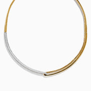 The Duo 14K Two Tone Yellow and White Gold Diamond Collar Necklace, 1.37 TCW features a modern design with a yellow gold band and an asymmetrical white gold section set with sparkling diamonds for striking contrast.