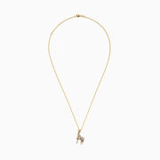 The Safari 14K Yellow Gold Espresso & White Diamond Giraffe Pendant, 0.43 TCW, features black, white, and brown sparkling crystals on a delicate gold chain, shown against a white background.