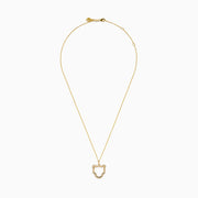 The Signature 14K Yellow Gold Diamond Panther Silhouette Pendant features a minimalist open panther design on a chain, accented with small white gemstones along the edges.