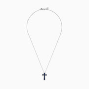A 14K white gold necklace featuring a blue sapphire and diamond cross pendant, 0.91 total carat weight.